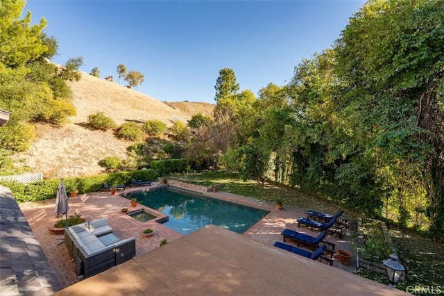 5250 Scott Robertson Rd, Hidden Hills, CA 91302 - view of swimming pool featuring a patio and a pool with connected hot tub