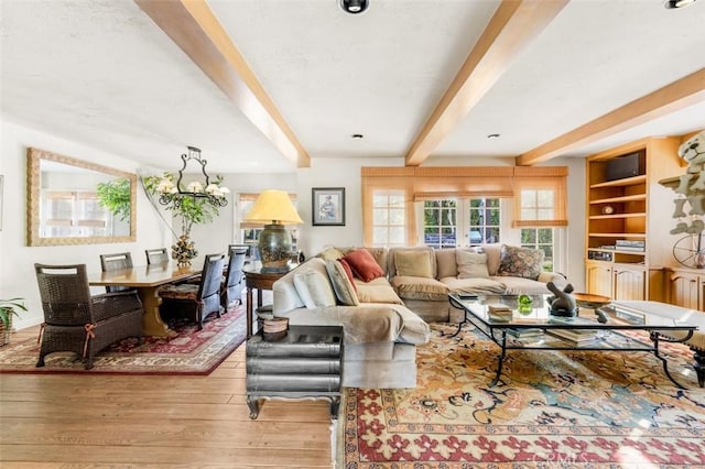 5250 Scott Robertson Rd, Hidden Hills, CA 91302 - living room with light wood-style floors, beamed ceiling, and a chandelier