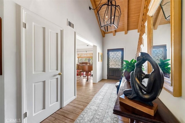 5250 Scott Robertson Rd, Hidden Hills, CA 91302 - entryway with a chandelier, light wood-style floors, and wooden ceiling