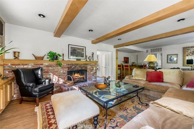 5250 Scott Robertson Rd, Hidden Hills, CA 91302 - living room featuring a fireplace, light wood-style flooring, and beam ceiling