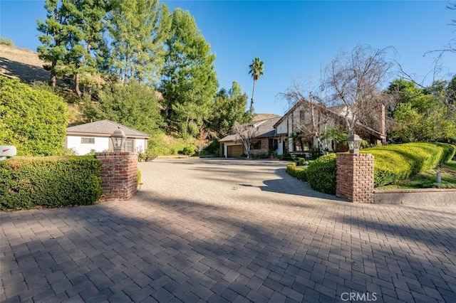 5250 Scott Robertson Rd, Hidden Hills, CA 91302 - view of front of property with an attached garage