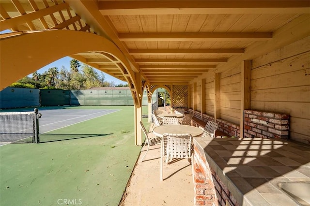 5250 Scott Robertson Rd, Hidden Hills, CA 91302 - view of tennis court featuring a patio