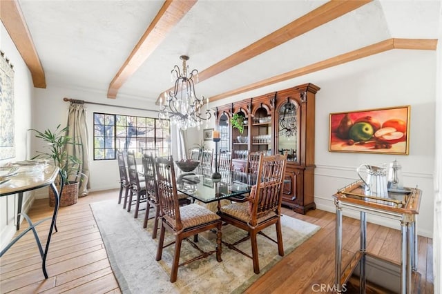 5250 Scott Robertson Rd, Hidden Hills, CA 91302 - dining area with beamed ceiling, light wood-style floors, and a chandelier