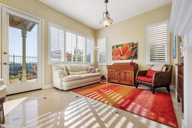 7243 Surfbird Cir, Carlsbad, CA 92011 - tiled living room with baseboards