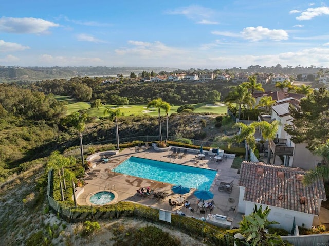 7243 Surfbird Cir, Carlsbad, CA 92011 - community pool with a patio, view of golf course, and a hot tub
