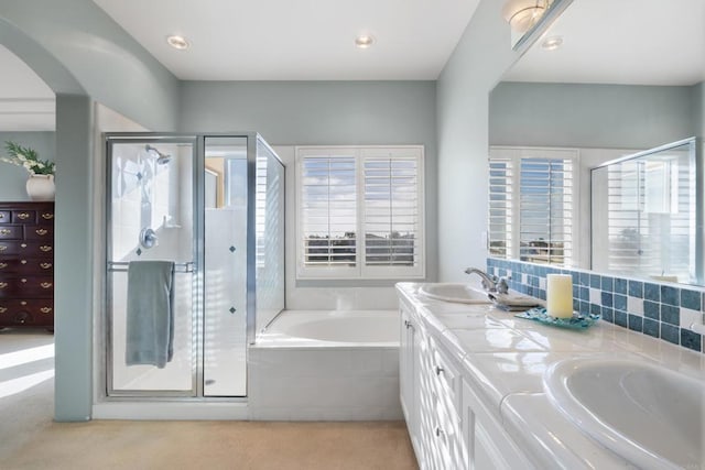 7243 Surfbird Cir, Carlsbad, CA 92011 - full bath featuring a garden tub, double vanity, a stall shower, and recessed lighting