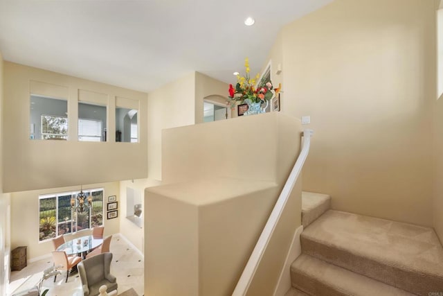7243 Surfbird Cir, Carlsbad, CA 92011 - staircase with a chandelier, healthy amount of natural light, and recessed lighting