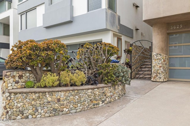 3629 Ocean Dr, Oxnard, CA 93035 - doorway to property featuring stucco siding