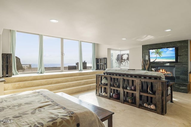 3629 Ocean Dr, Oxnard, CA 93035 - tiled bedroom featuring a large fireplace and recessed lighting