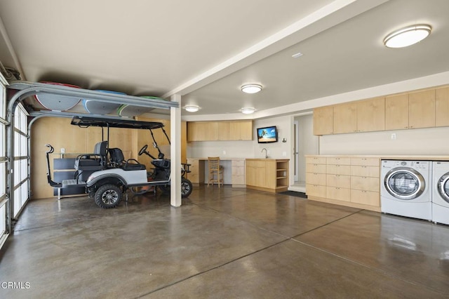 3629 Ocean Dr, Oxnard, CA 93035 - garage with separate washer and dryer and a sink