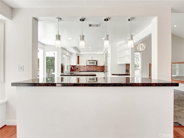 20472 Via Marwah, Yorba Linda, CA 92886 - kitchen featuring white cabinetry, healthy amount of natural light, open shelves, light wood-type flooring, and recessed lighting