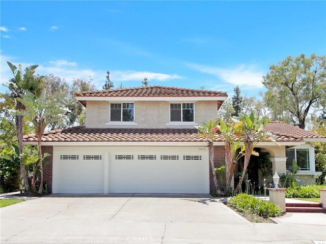 20472 Via Marwah, Yorba Linda, CA 92886 - mediterranean / spanish-style house with a tile roof, driveway, stucco siding, and an attached garage