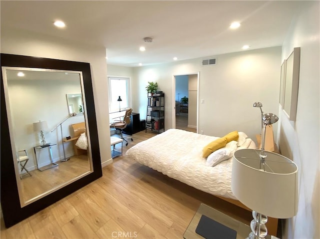 3407 Huxley St Unit 39, Los Angeles, CA 90027 - bedroom with light wood-type flooring and recessed lighting