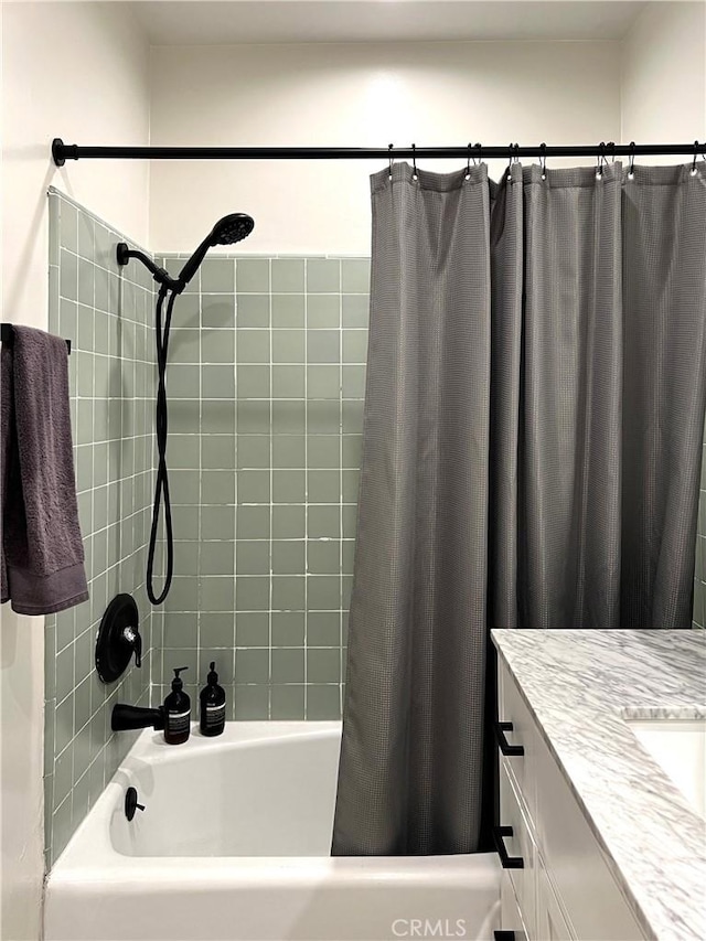 3407 Huxley St Unit 39, Los Angeles, CA 90027 - bathroom with shower / bath combo with shower curtain and vanity