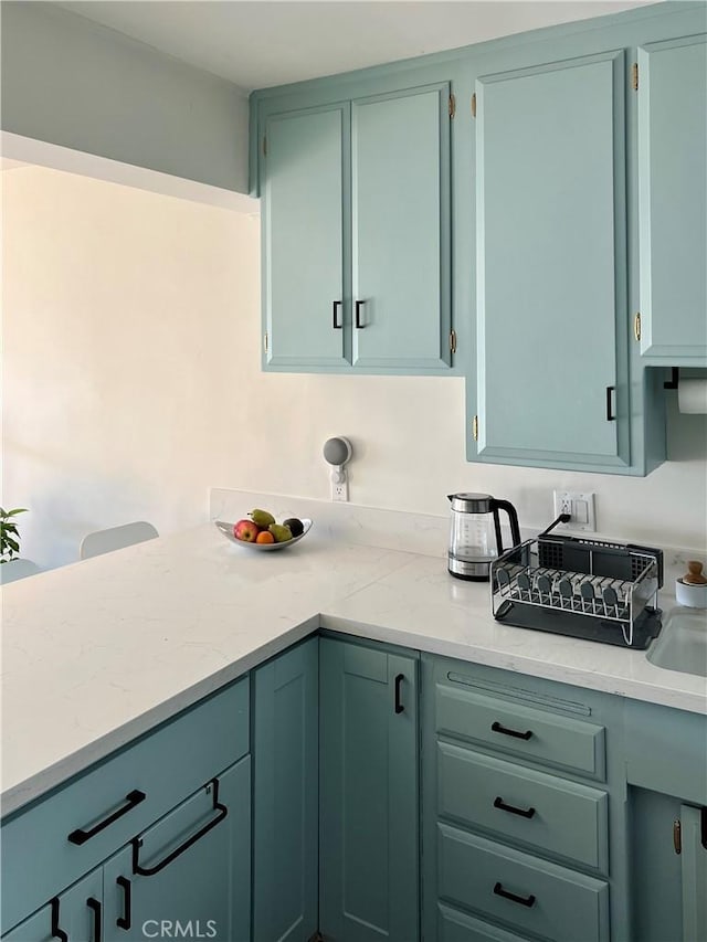3407 Huxley St Unit 39, Los Angeles, CA 90027 - kitchen featuring light stone countertops