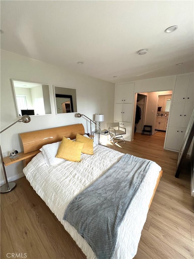 3407 Huxley St Unit 39, Los Angeles, CA 90027 - bedroom with light wood finished floors