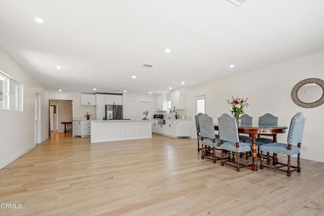 2165 W 115th St, Hawthorne, CA 90250 - dining area with light wood finished floors and recessed lighting