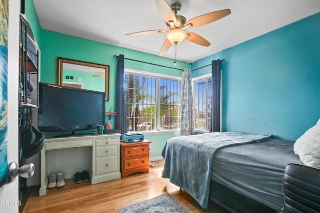 2165 W 115th St, Hawthorne, CA 90250 - bedroom with wood finished floors and ceiling fan