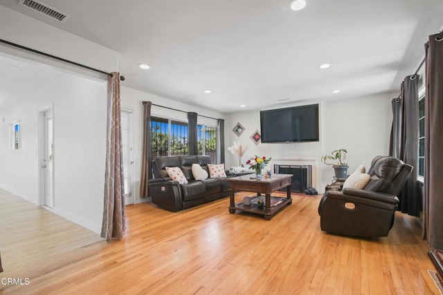 2165 W 115th St, Hawthorne, CA 90250 - living room featuring light wood-style floors and recessed lighting