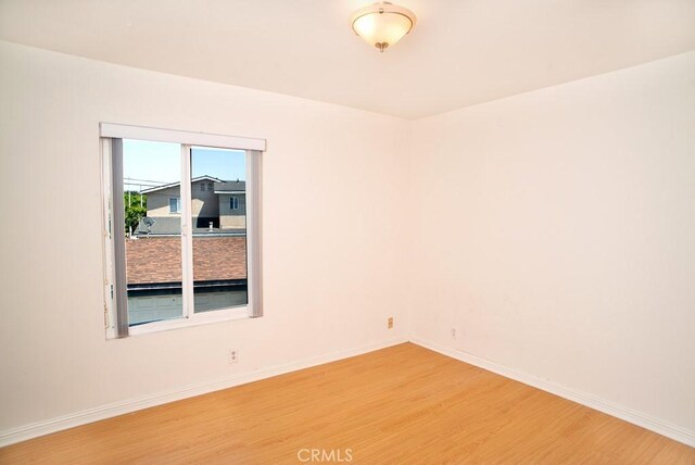 1718 Puente Ave Unit 40, Baldwin Park, CA 91706 - empty room with light wood-style floors and baseboards