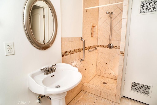 1718 Puente Ave Unit 40, Baldwin Park, CA 91706 - bathroom with a stall shower, tile walls, and tile patterned flooring