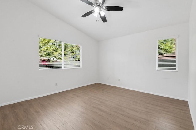 5185 Konic Ct, Riverside, CA 92509 - unfurnished room featuring plenty of natural light, lofted ceiling, wood finished floors, and ceiling fan
