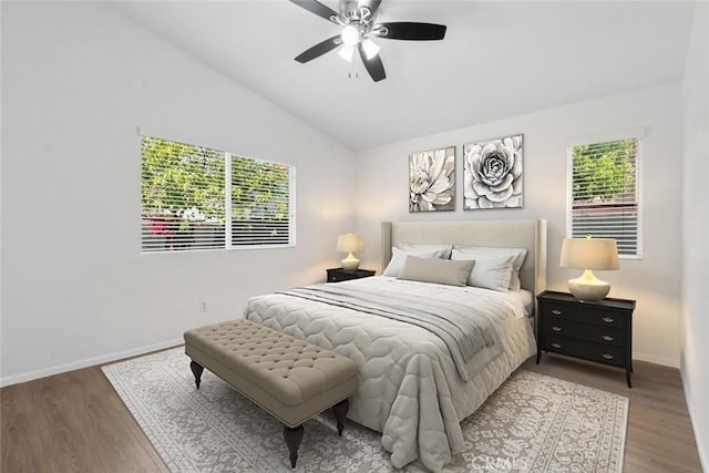 5185 Konic Ct, Riverside, CA 92509 - bedroom featuring vaulted ceiling, multiple windows, wood finished floors, and ceiling fan