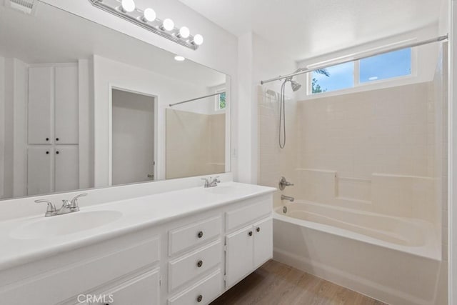5185 Konic Ct, Riverside, CA 92509 - full bathroom featuring bathing tub / shower combination, wood finished floors, and double vanity