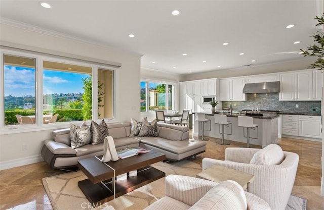 3 Atlantis Cv, Newport Coast, CA 92657 - living room featuring crown molding and recessed lighting