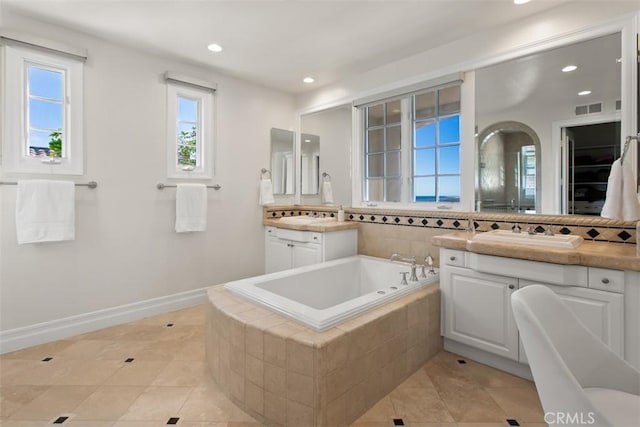 3 Atlantis Cv, Newport Coast, CA 92657 - full bath with two vanities, tile patterned flooring, a bath, and recessed lighting