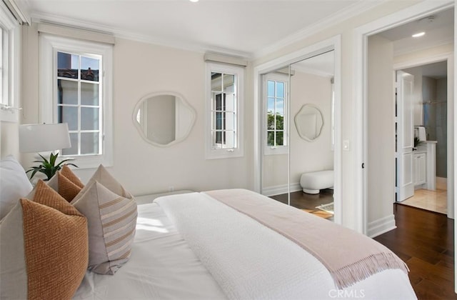 3 Atlantis Cv, Newport Coast, CA 92657 - bedroom with wood finished floors, a closet, ornamental molding, multiple windows, and recessed lighting