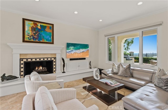 3 Atlantis Cv, Newport Coast, CA 92657 - living area featuring crown molding, recessed lighting, and a tile fireplace