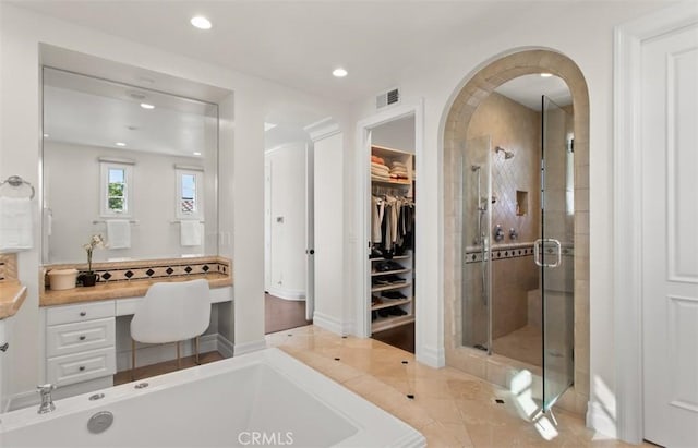 3 Atlantis Cv, Newport Coast, CA 92657 - full bathroom featuring a shower stall, recessed lighting, a tub, a walk in closet, and vanity