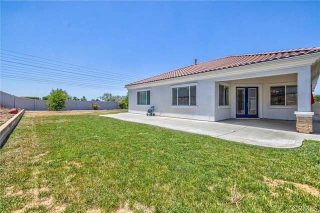 1708 Snowberry Rd, Beaumont, CA 92223 - rear view of property with french doors, stucco siding, a patio area, and a tiled roof