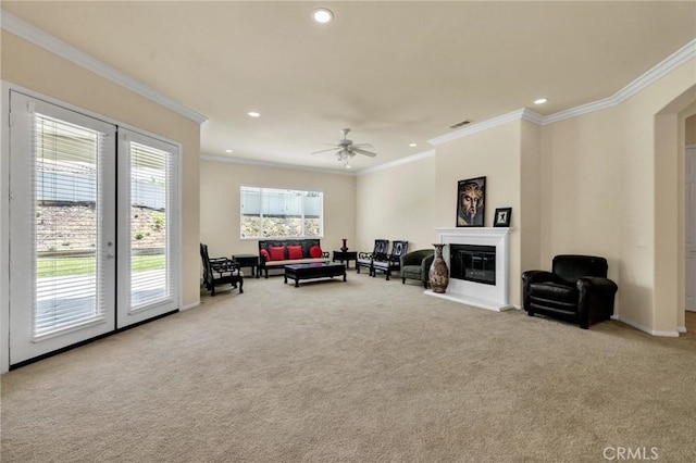 1708 Snowberry Rd, Beaumont, CA 92223 - carpeted living room featuring recessed lighting, ornamental molding, a glass covered fireplace, and a ceiling fan