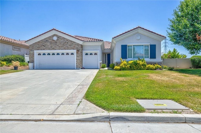 1708 Snowberry Rd, Beaumont, CA 92223 - view of front facade with a garage, a tiled roof, concrete driveway, stone siding, and stucco siding