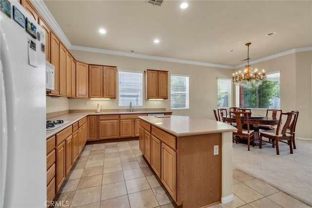 1708 Snowberry Rd, Beaumont, CA 92223 - kitchen featuring white appliances, light countertops, a chandelier, light colored carpet, and light tile patterned flooring