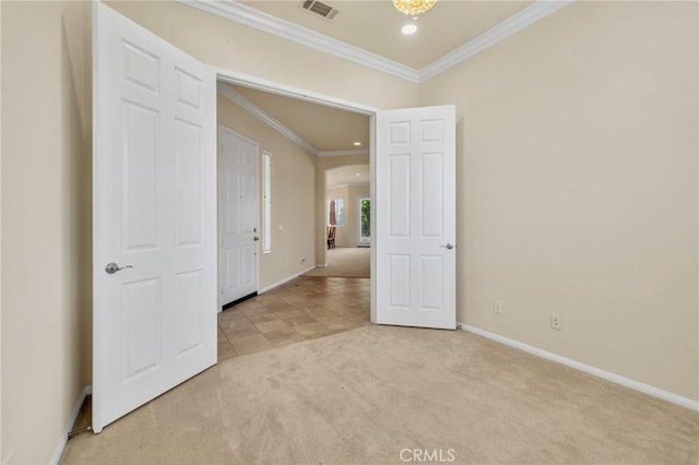 1708 Snowberry Rd, Beaumont, CA 92223 - spare room with light carpet, crown molding, recessed lighting, and arched walkways