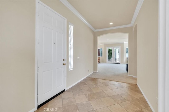 1708 Snowberry Rd, Beaumont, CA 92223 - foyer with arched walkways, crown molding, light carpet, and recessed lighting