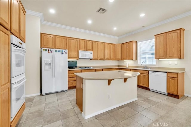 1708 Snowberry Rd, Beaumont, CA 92223 - kitchen featuring white appliances, a center island, crown molding, light countertops, and a breakfast bar