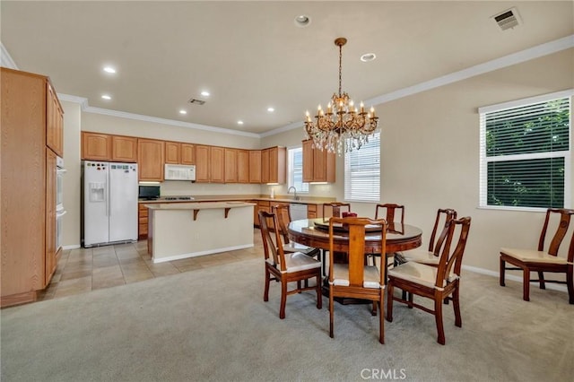 1708 Snowberry Rd, Beaumont, CA 92223 - dining area with ornamental molding, light colored carpet, a chandelier, recessed lighting, and light tile patterned floors