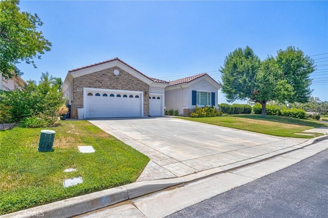1708 Snowberry Rd, Beaumont, CA 92223 - view of front of home featuring stone siding, a tiled roof, a front yard, driveway, and an attached garage