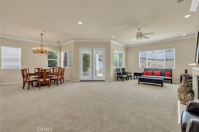 1708 Snowberry Rd, Beaumont, CA 92223 - carpeted living room featuring a chandelier, recessed lighting, ornamental molding, and a ceiling fan