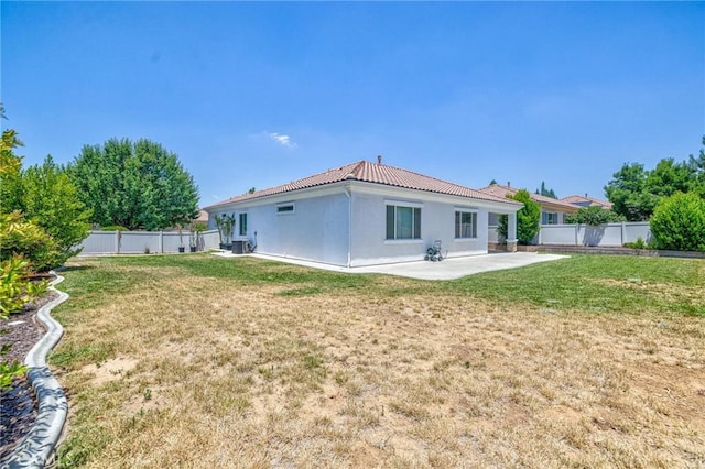 1708 Snowberry Rd, Beaumont, CA 92223 - back of house with a patio, a fenced backyard, stucco siding, and a tiled roof