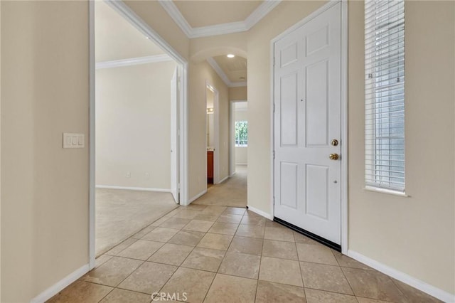 1708 Snowberry Rd, Beaumont, CA 92223 - foyer featuring crown molding, light tile patterned floors, arched walkways, and light carpet