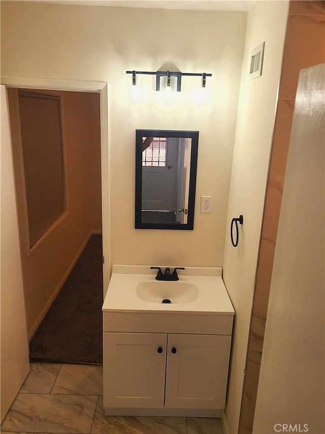 12817 Larwin Rd, Norwalk, CA 90650 - bathroom with vanity and marble finish floors