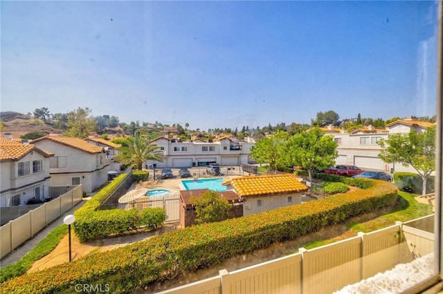 24232 Sylvan Glen Rd Unit A, Diamond Bar, CA 91765 - view of community featuring a residential view, a fenced backyard, and a swimming pool