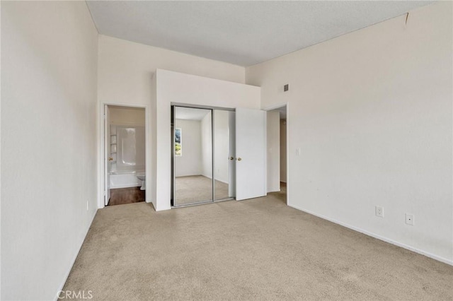 24232 Sylvan Glen Rd Unit A, Diamond Bar, CA 91765 - unfurnished bedroom featuring carpet floors, ensuite bathroom, and a closet