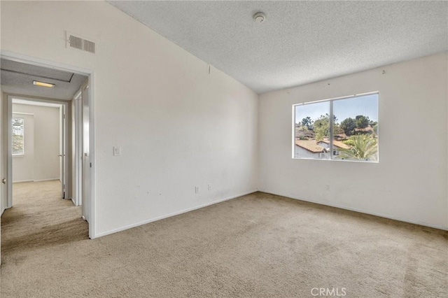 24232 Sylvan Glen Rd Unit A, Diamond Bar, CA 91765 - carpeted empty room featuring a textured ceiling and a smoke detector