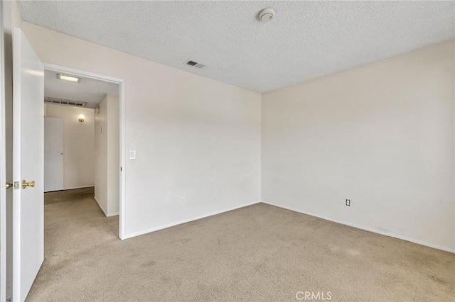 24232 Sylvan Glen Rd Unit A, Diamond Bar, CA 91765 - carpeted empty room with a textured ceiling and a smoke detector